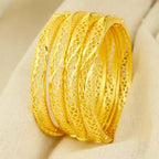 Elegant Gold-Tone Filigree Bangle Bracelet